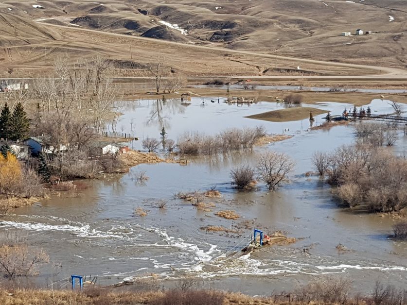 The suspension bridge that once hovered over the Kneehill Creek has since been submerged by the high water levels on Tuesday, April 24. The Carbon Campground area had the most water pooling out of the Kneehill Creek. Photos courtesy of H. Laffin.